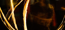 Flame twirling at night
