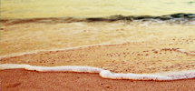 Waves washing onto beach